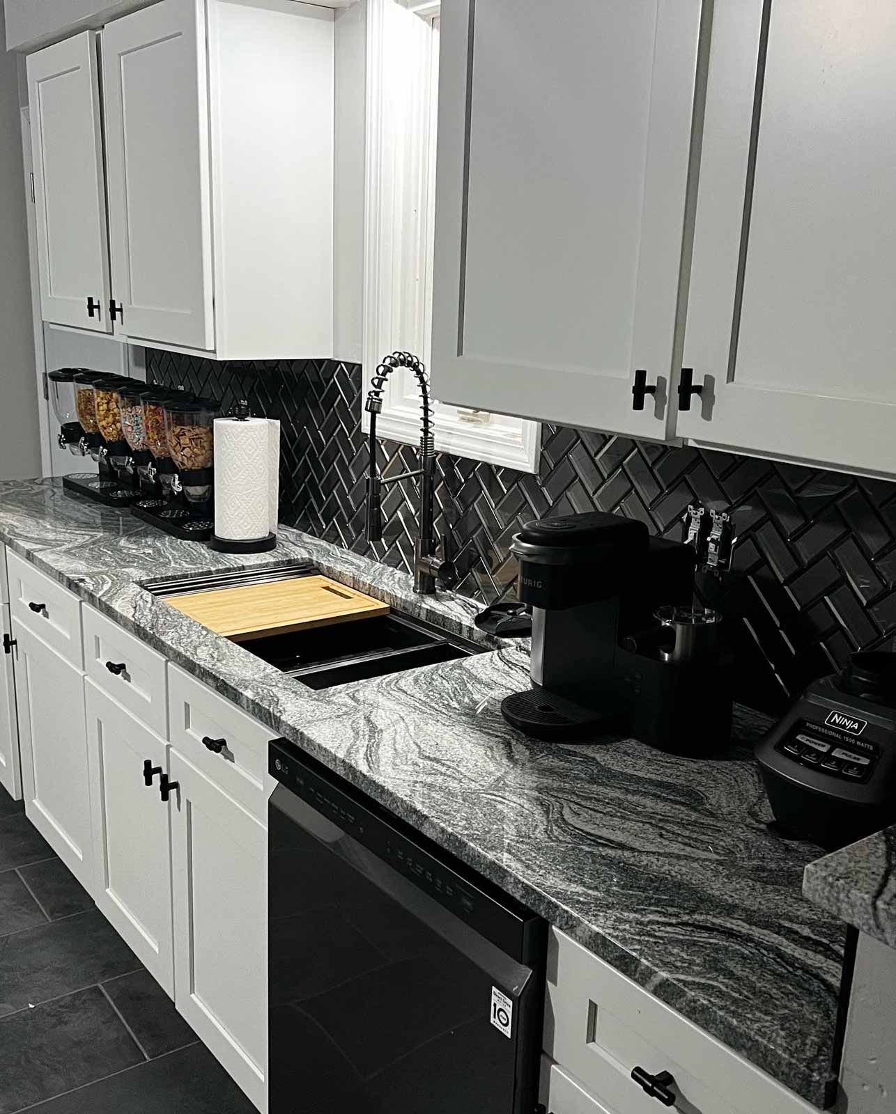 Kitchen sink with faux marble countertops