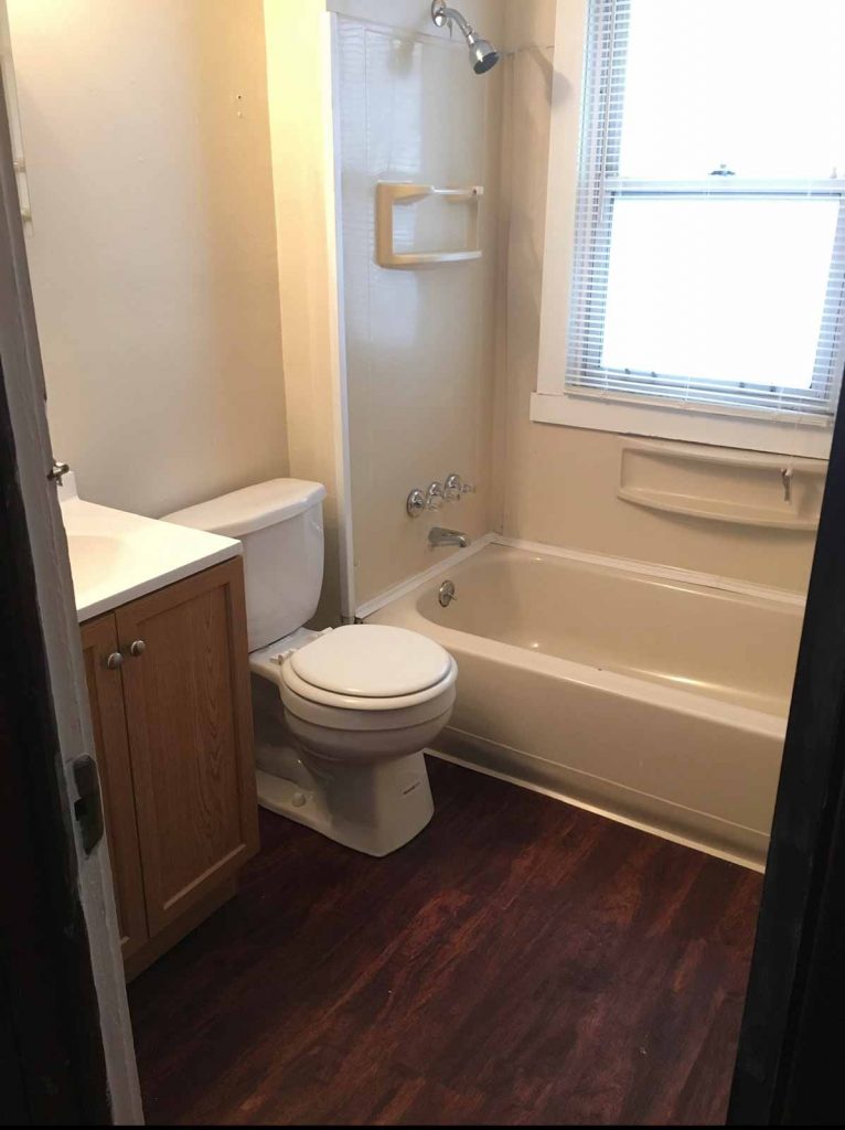 Bathroom with new linoleum flooring