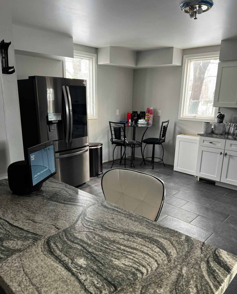 New kitchen with granite breakfast bar