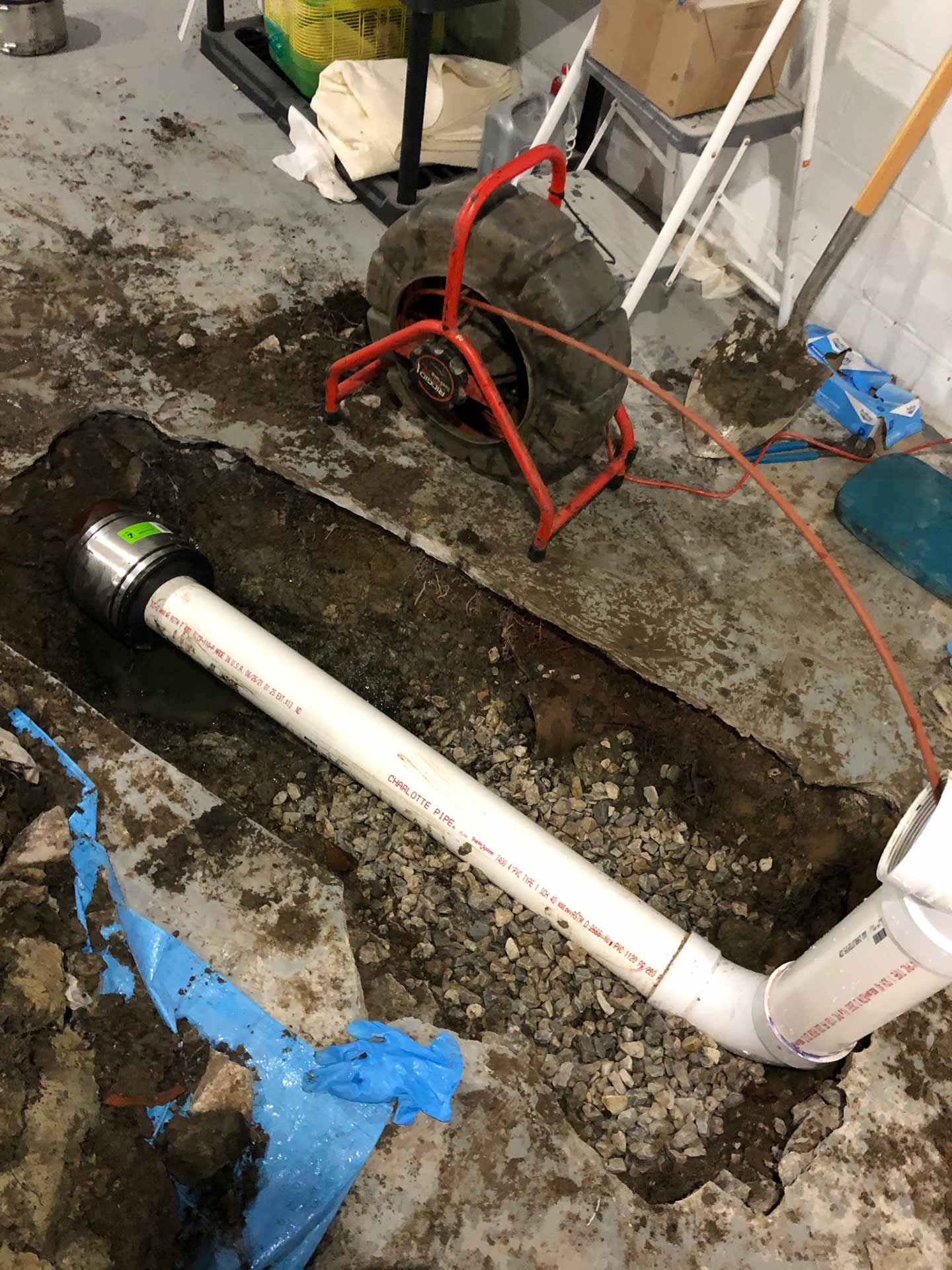 Installing a new pipe under a house