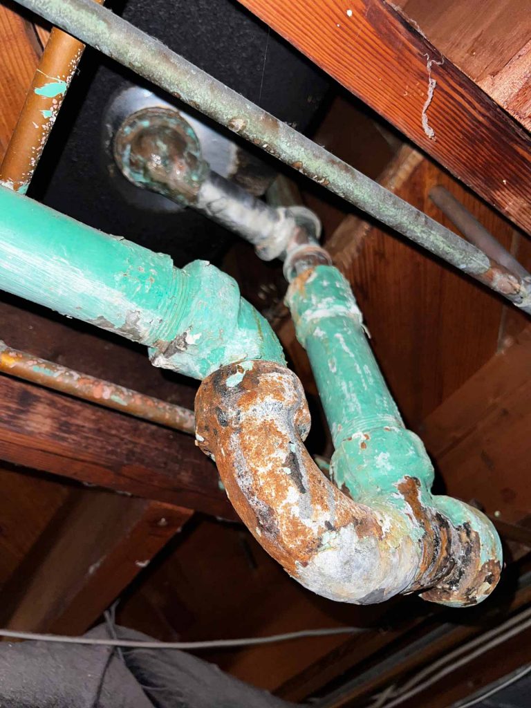 Corroded old copper pipes